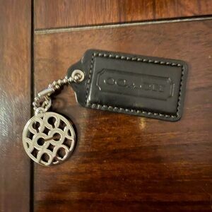 Coach Black Leather Tag with Silver Medallion